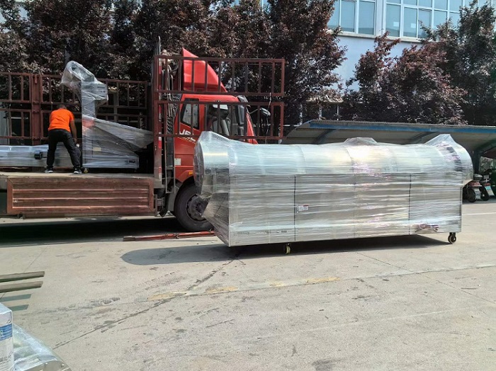 許昌智工四米全套電磁流水線炒瓜子機專車發(fā)往新疆